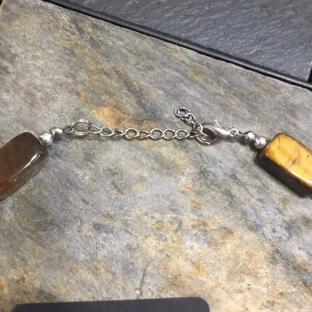 Necklace and earrings. New